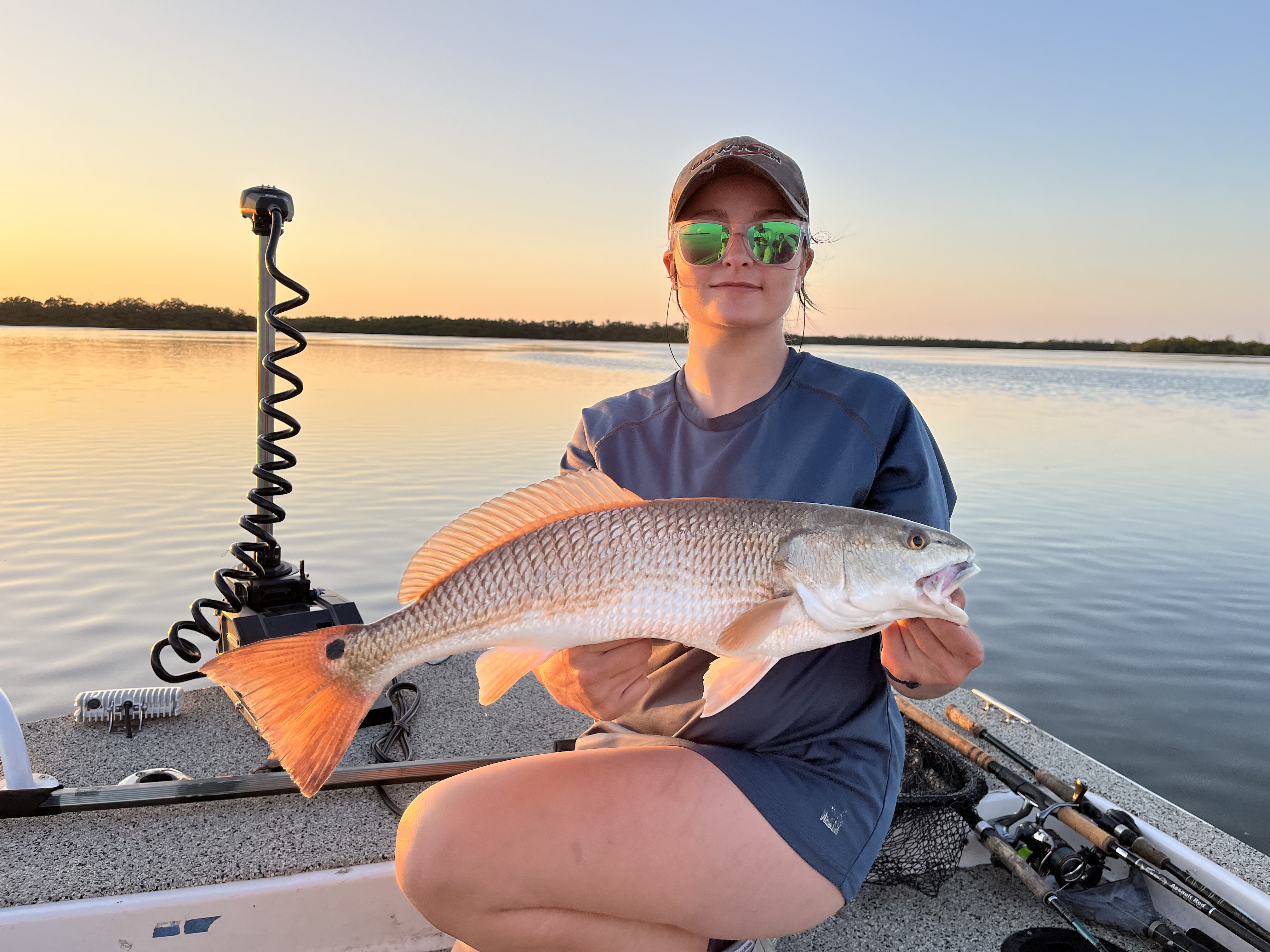 A proud angler with their impressive catch